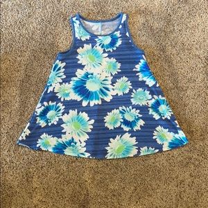 Justice blue floral tank top.